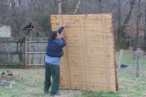 moving_fence_panels_doing_a_lawn_care_job_in_china_grove_nc